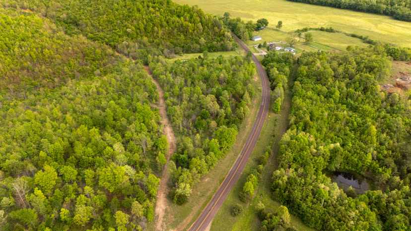 Aerial view of wooded rural acreage